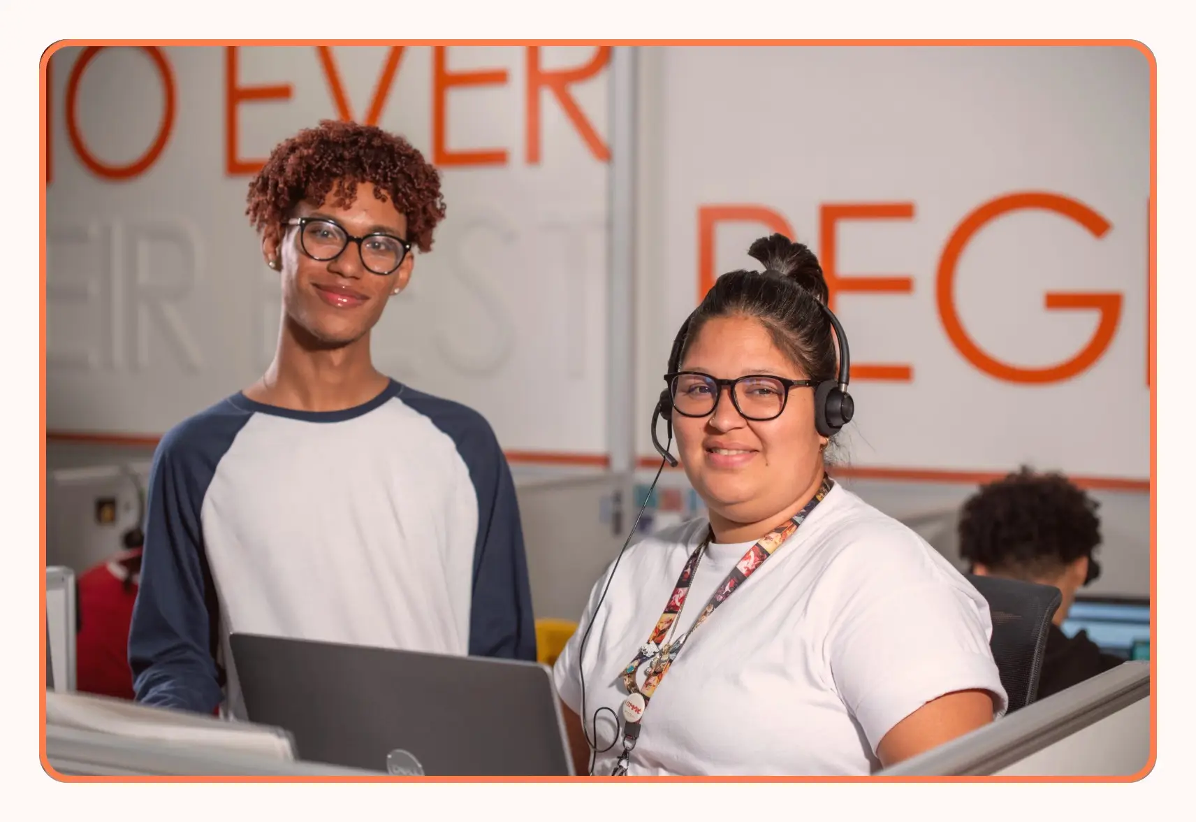 Two VoiceTeam agents at their workstations