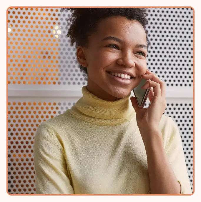 A customer on a call, smiling