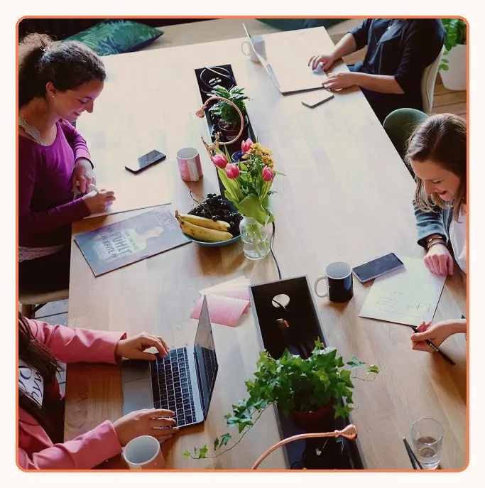 A team working together around a shared table