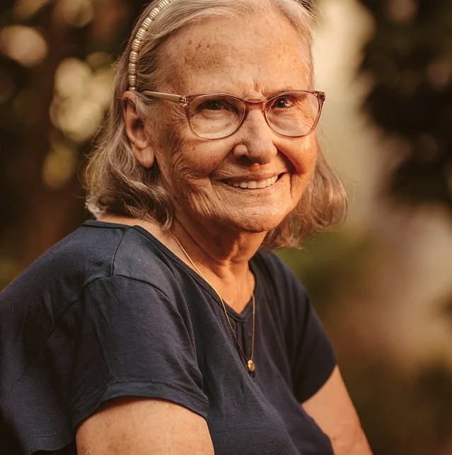 Smiling older woman in glasses